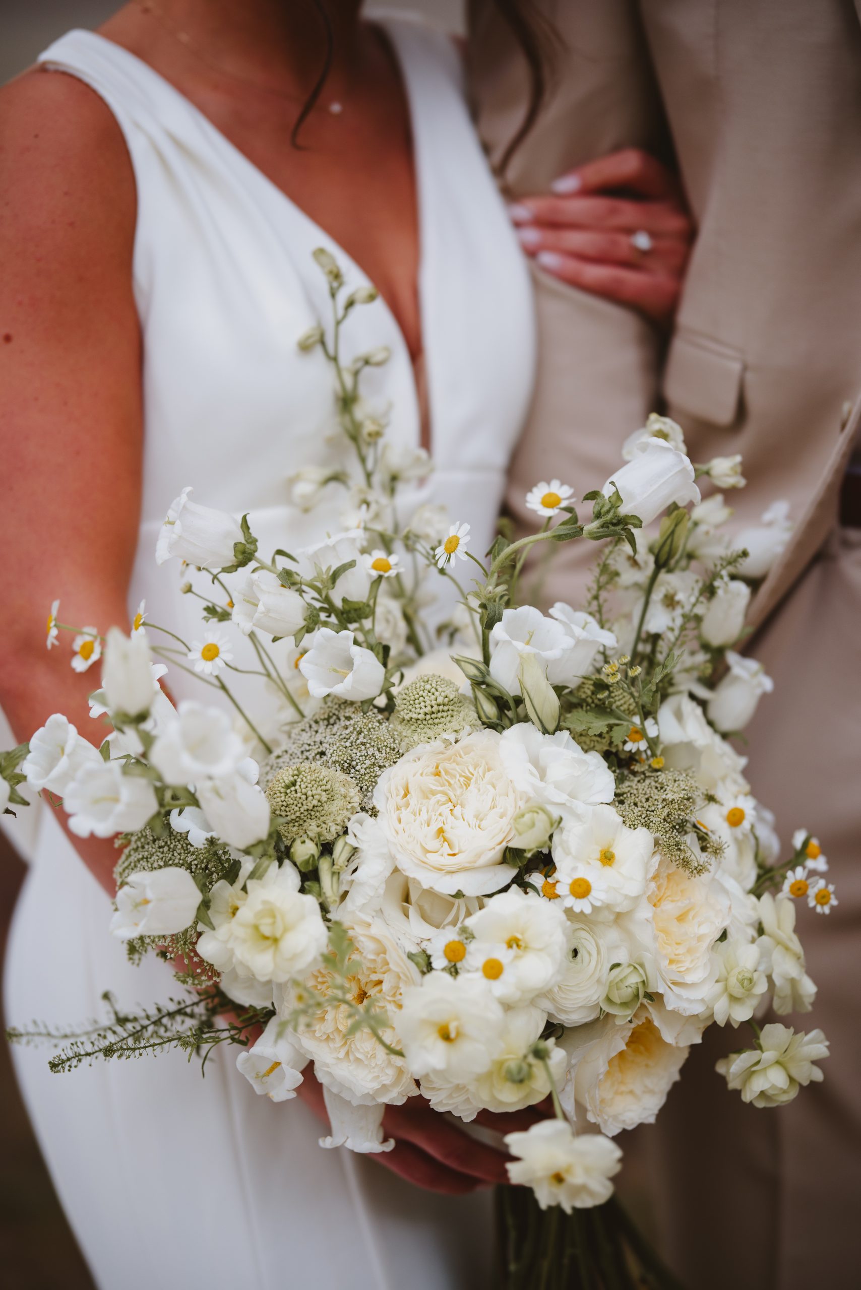 Charleston wedding photographer captures up close wedding flower details of the brides wedding bouquet. 