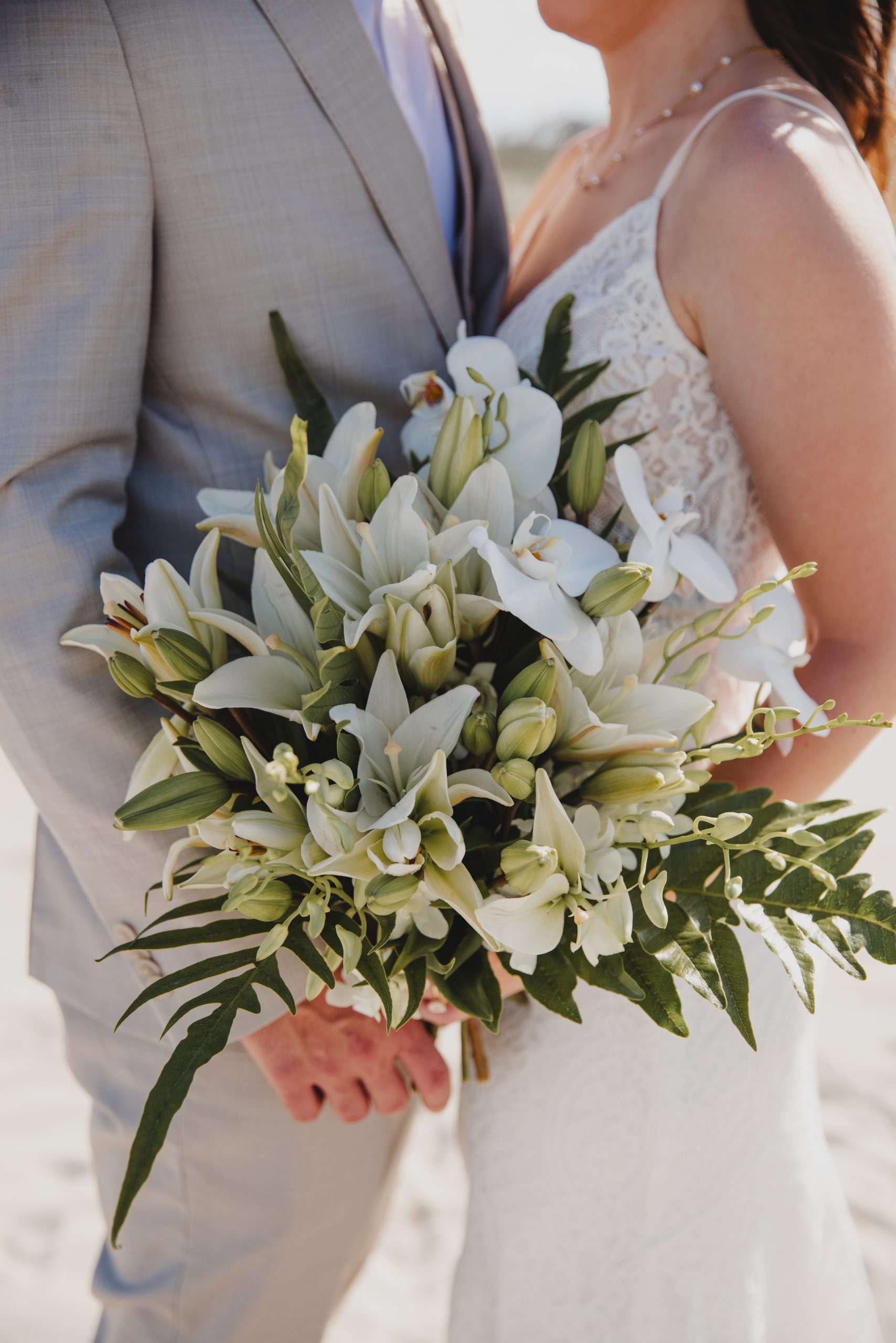 Myrtle Beach wedding photographer captures bride and groom wedding day details of the wedding bouquet up close