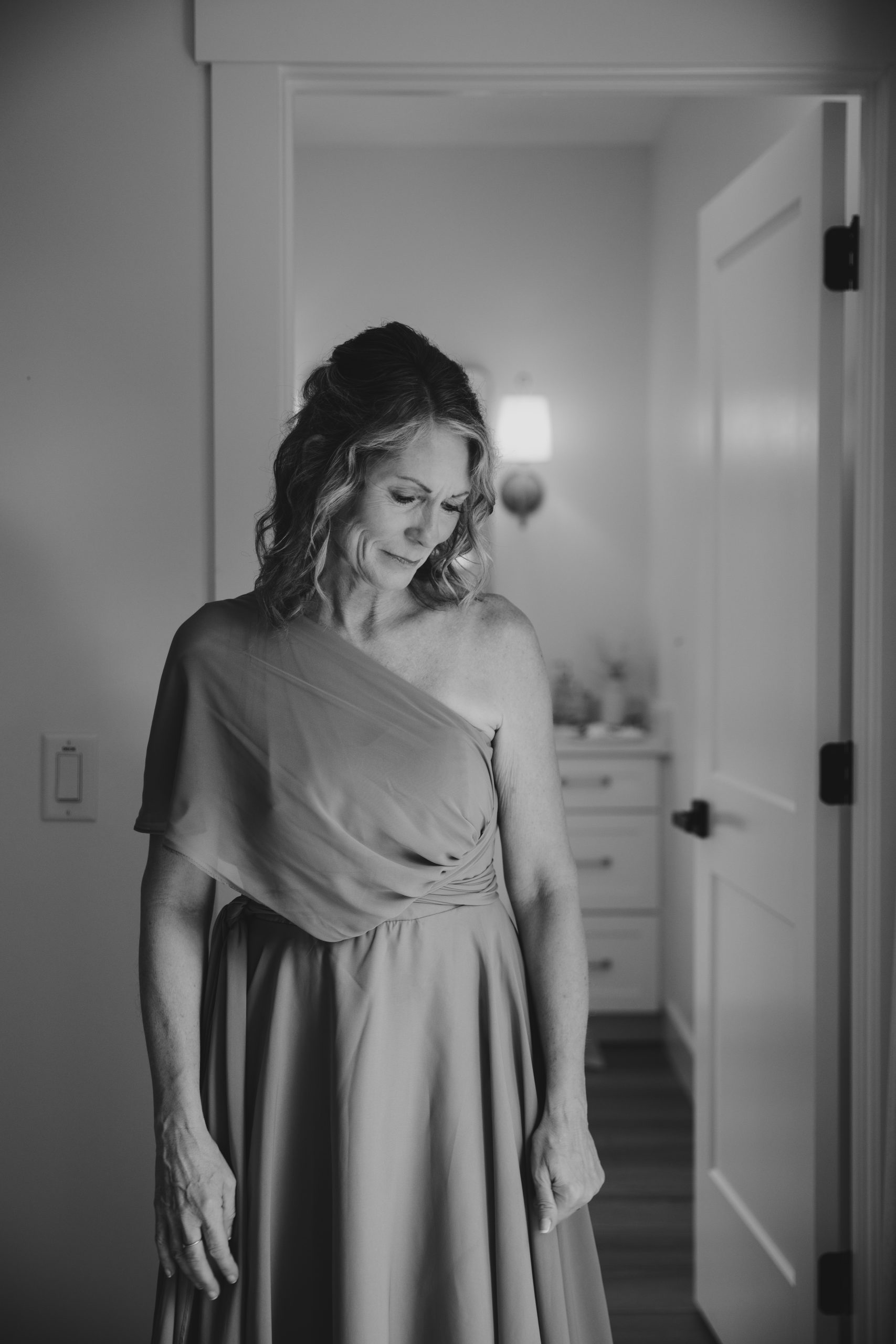 Emily Peek (8 of 64) Mother of the bride cries after seeing her daughter dressed. Summerville Wedding Photographer captures the moment